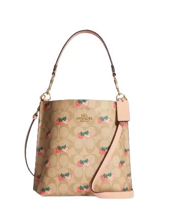 Coach bags with a front - flap pocket and a turnlock for a classic aestheticCoach Mollie Bucket Bag 22 In Signature Canvas With Strawberry Print