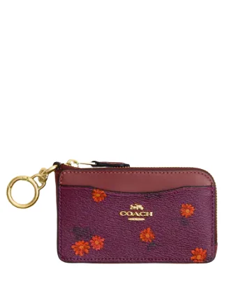 Coach Rogue bags featuring the signature C - hardware for a branded lookCoach Multifunction Card Case With Country Floral Print