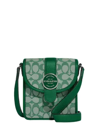 Coach Rogue bags featuring the signature C - hardware for a branded lookCoach North South Lonnie Crossbody In Signature Jacquard