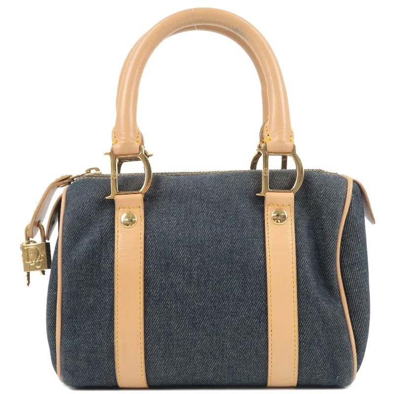 Christian Dior handbags with a snap - button closure and a decorative buckleChristian Dior Denim Leather Small Boston Bag Navy Beige